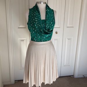 Sleeveless, scoop neck blouse